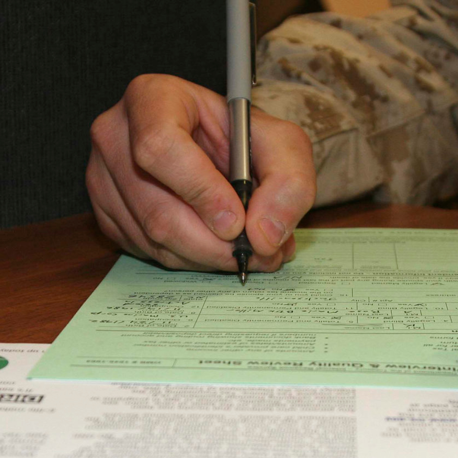 Service member filling out form