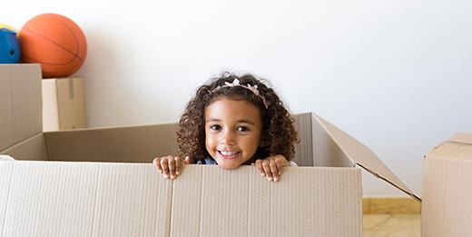 Child in moving box