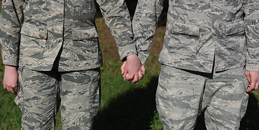 Military couple holding hands