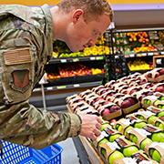 Service member shopping for groceries