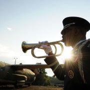 A U.S. Air Force bugler plays his instrument. 