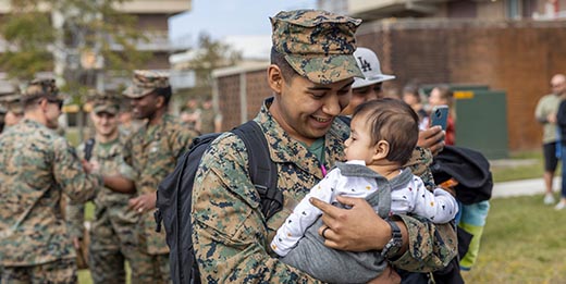 Service member with family member