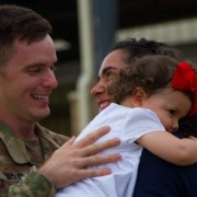 Soldier, wife and daughter reunite after a long deployment.