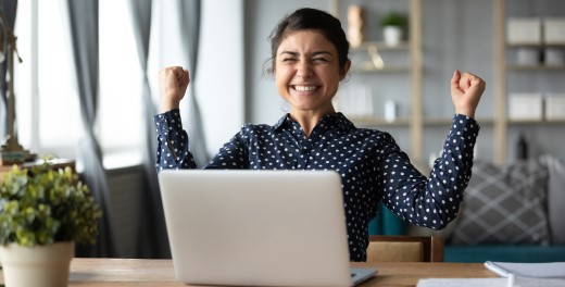Sitting woman with athletic clothes with mobile phone