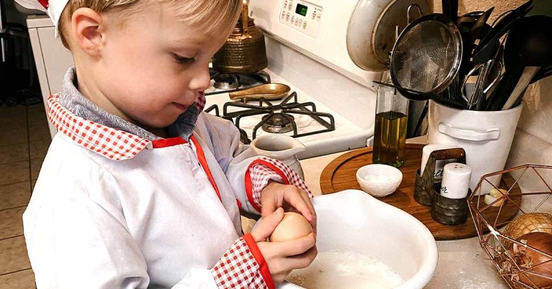 Sydney’s son baking in the kitchen.