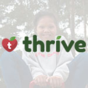 Thrive logo with happy child