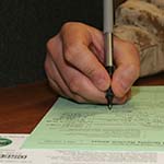Service member filling out form