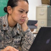 Service member on laptop