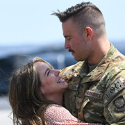 Military couple looking at each other