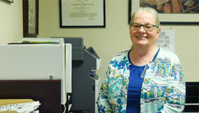 civilian standing in an office