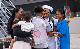 Coast guardsmen with family