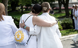 Family embraces at Gold Star ceremony