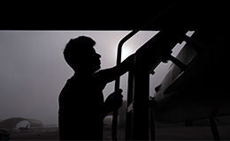 Silhouette of Service Member Working