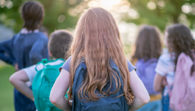 Children wearing backpacks