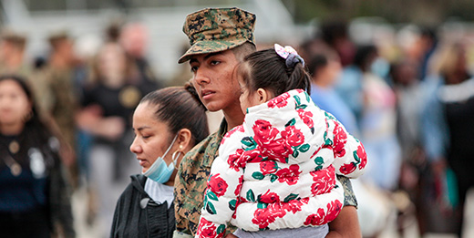 service member with family