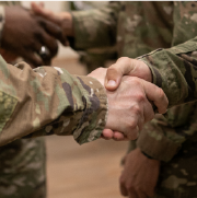 Service Members shaking hands