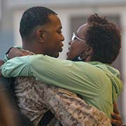 Service member and spouse reunite