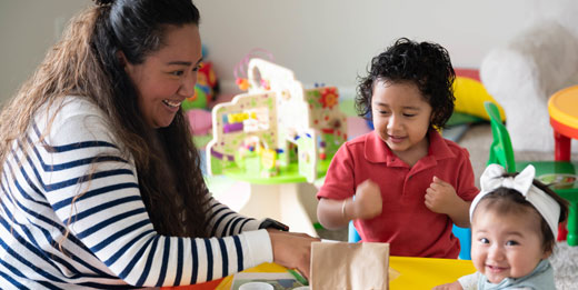 Woman playing with children