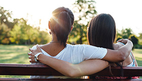 mother and daughter embracing