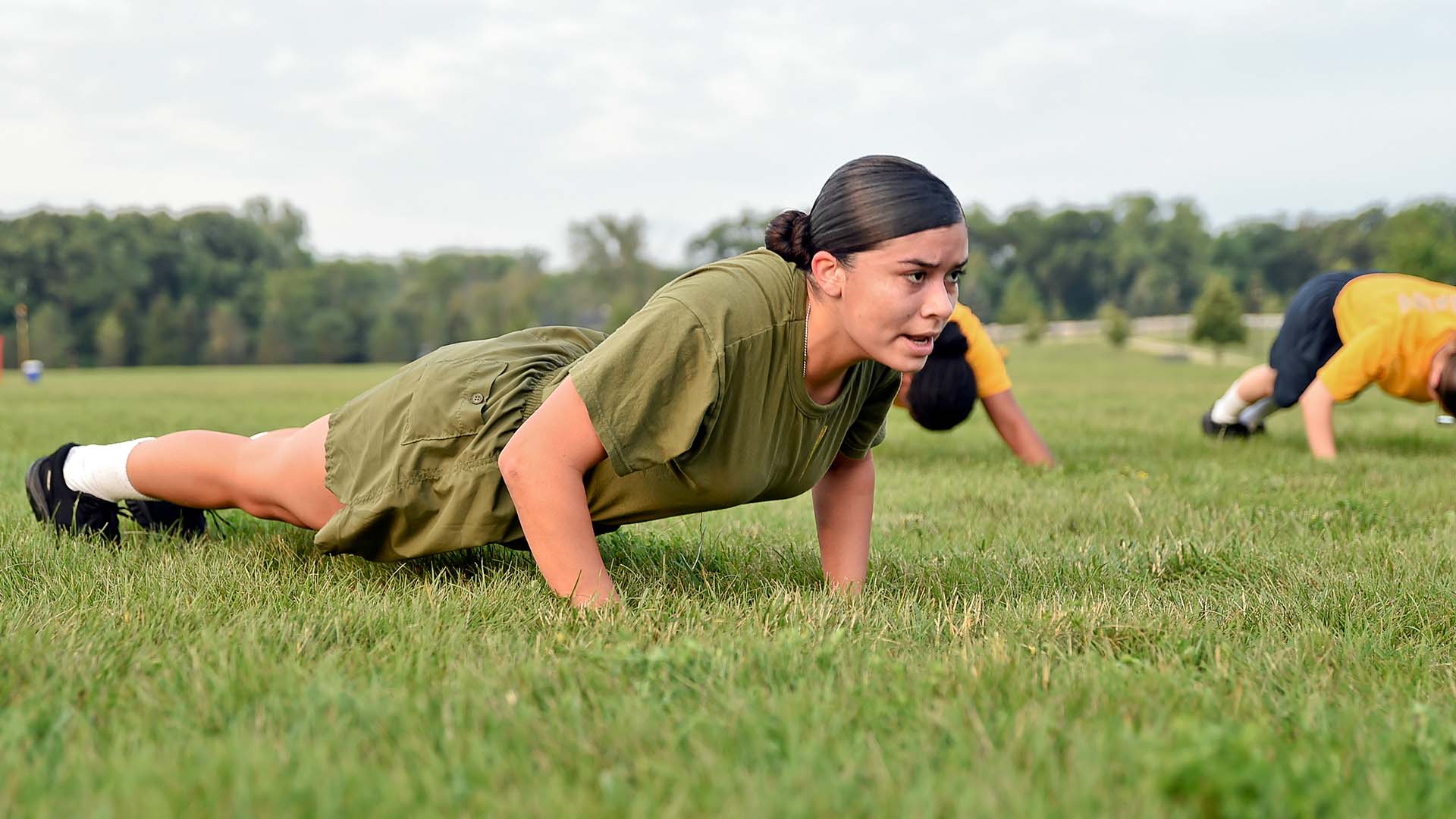Service member doing pushups