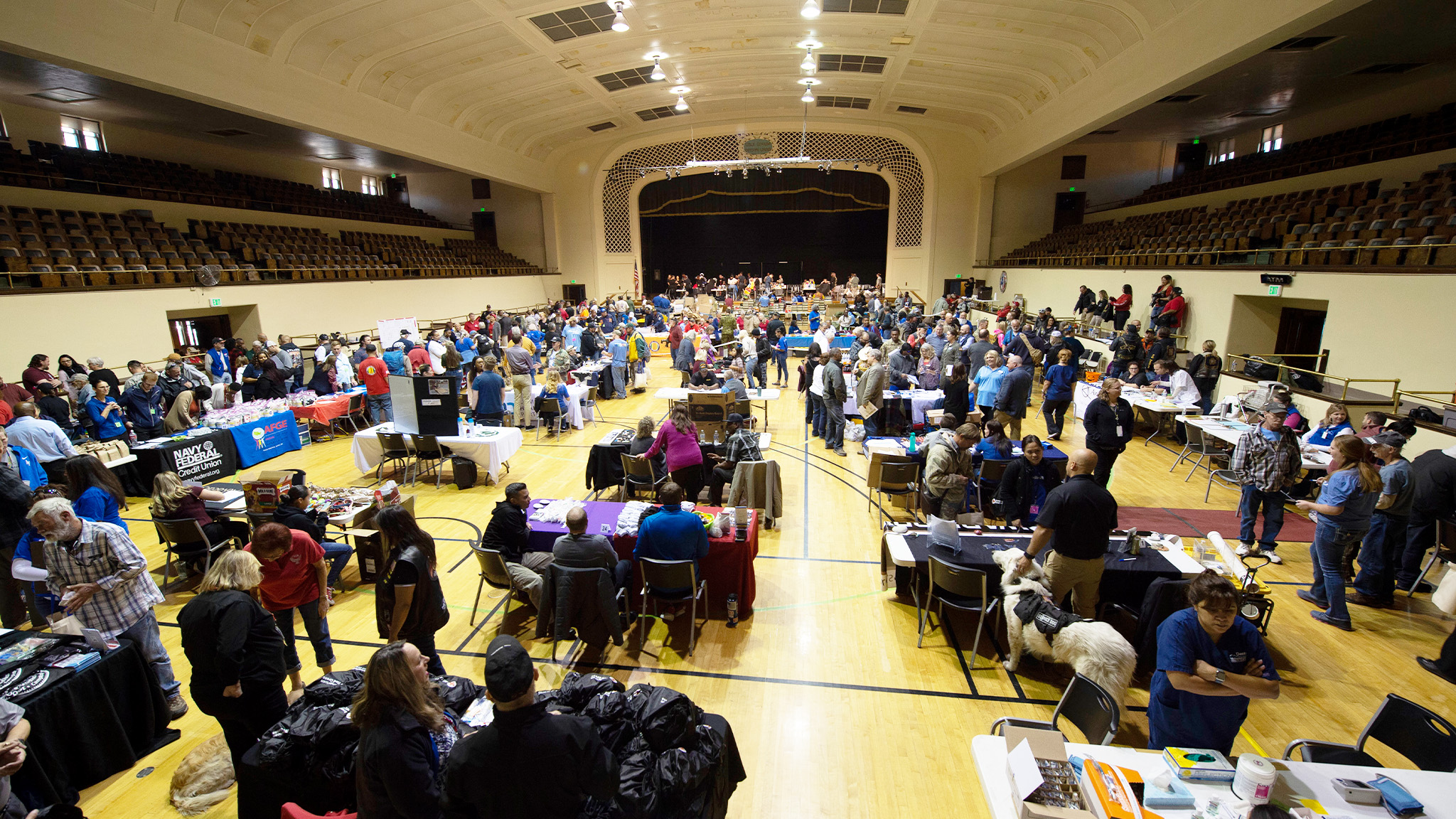 Homeless veterans gathered in an auditorium