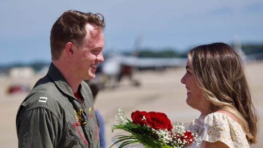 service member and spouse reunite