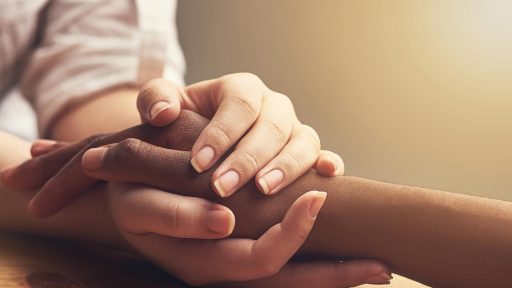 Holding hands in comfort