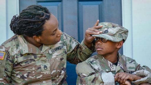 Military mom sits with son