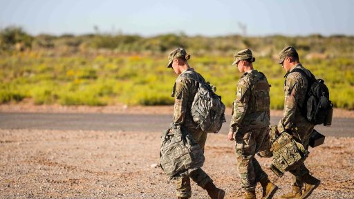 service members walking