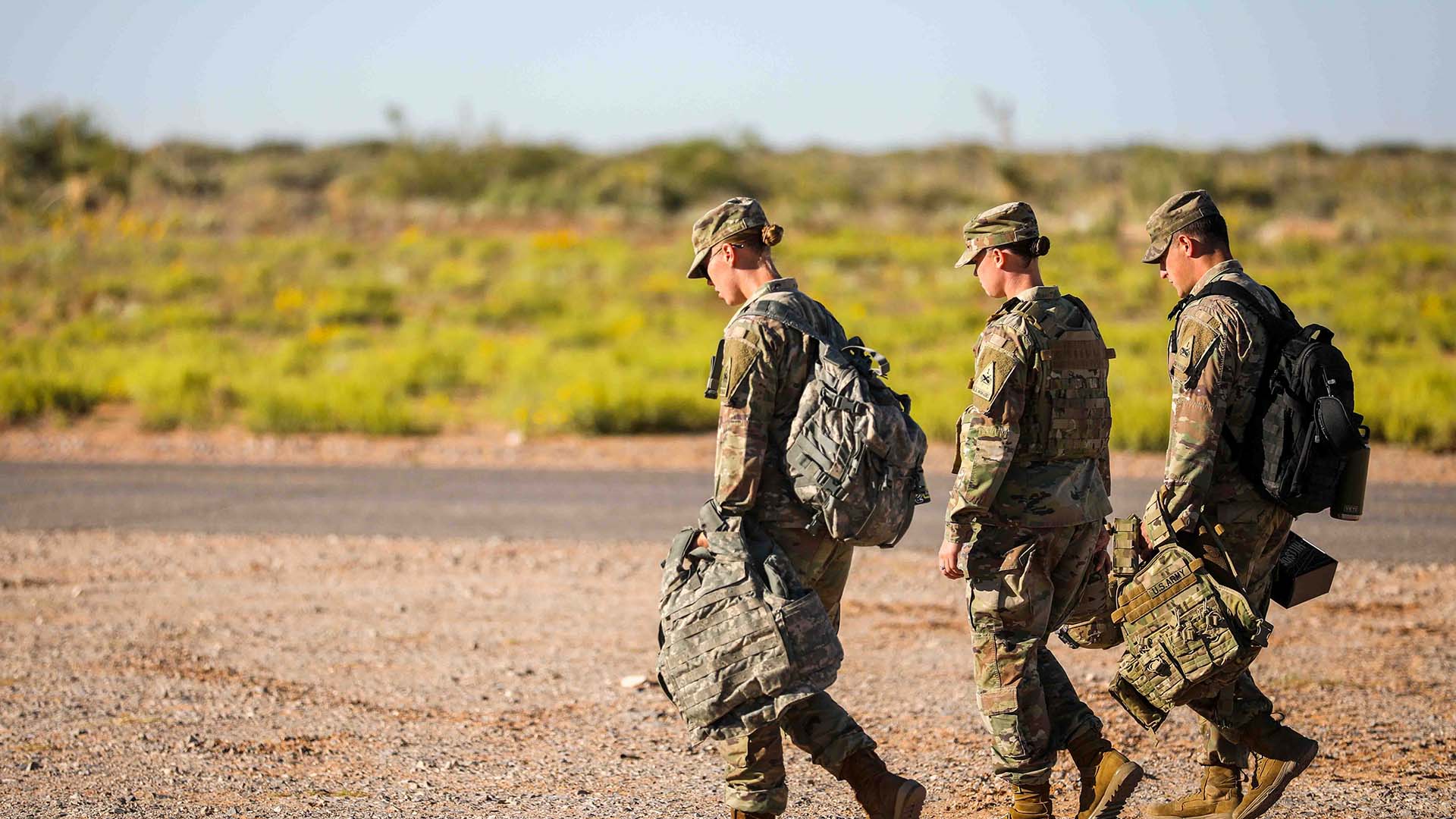 service members walking