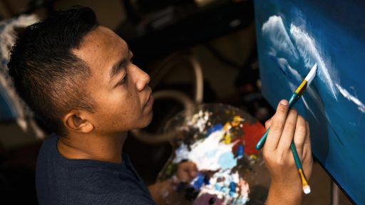 service member is painting