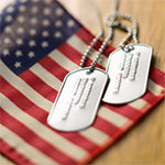 Dog tags on top of an American flag