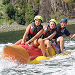A group of people tubing on the water