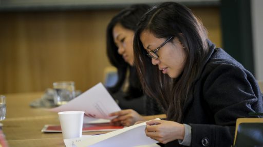 Woman looking over papers