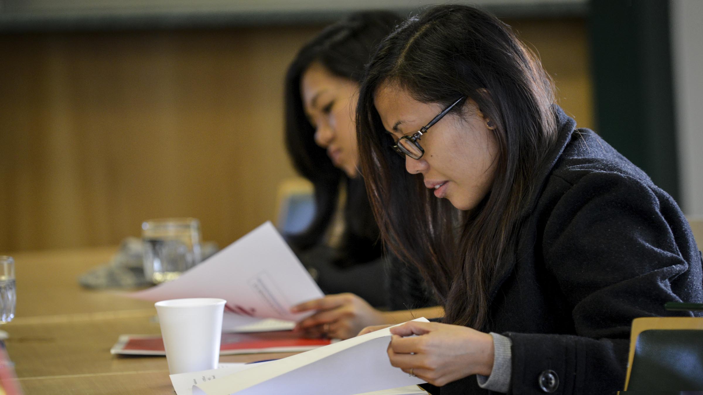 Woman looking over papers
