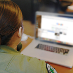 Women looking at computer screen