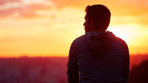 A man watching the sunset