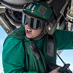 service member installing a transmitter