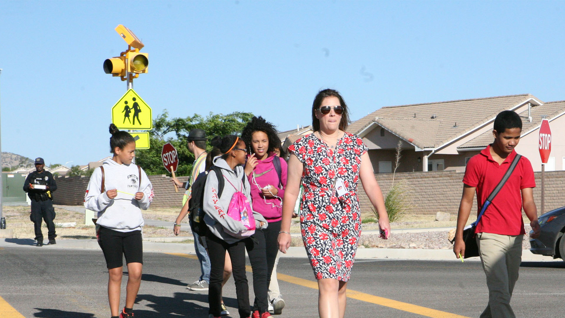 Students walk through crosswalk