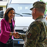 Council speaking with service member