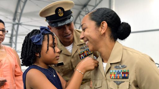 Navy chief is pinned by family