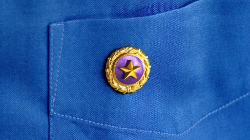 Gold Star on blue shirt