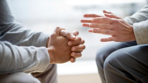 close up of hands during a conversation