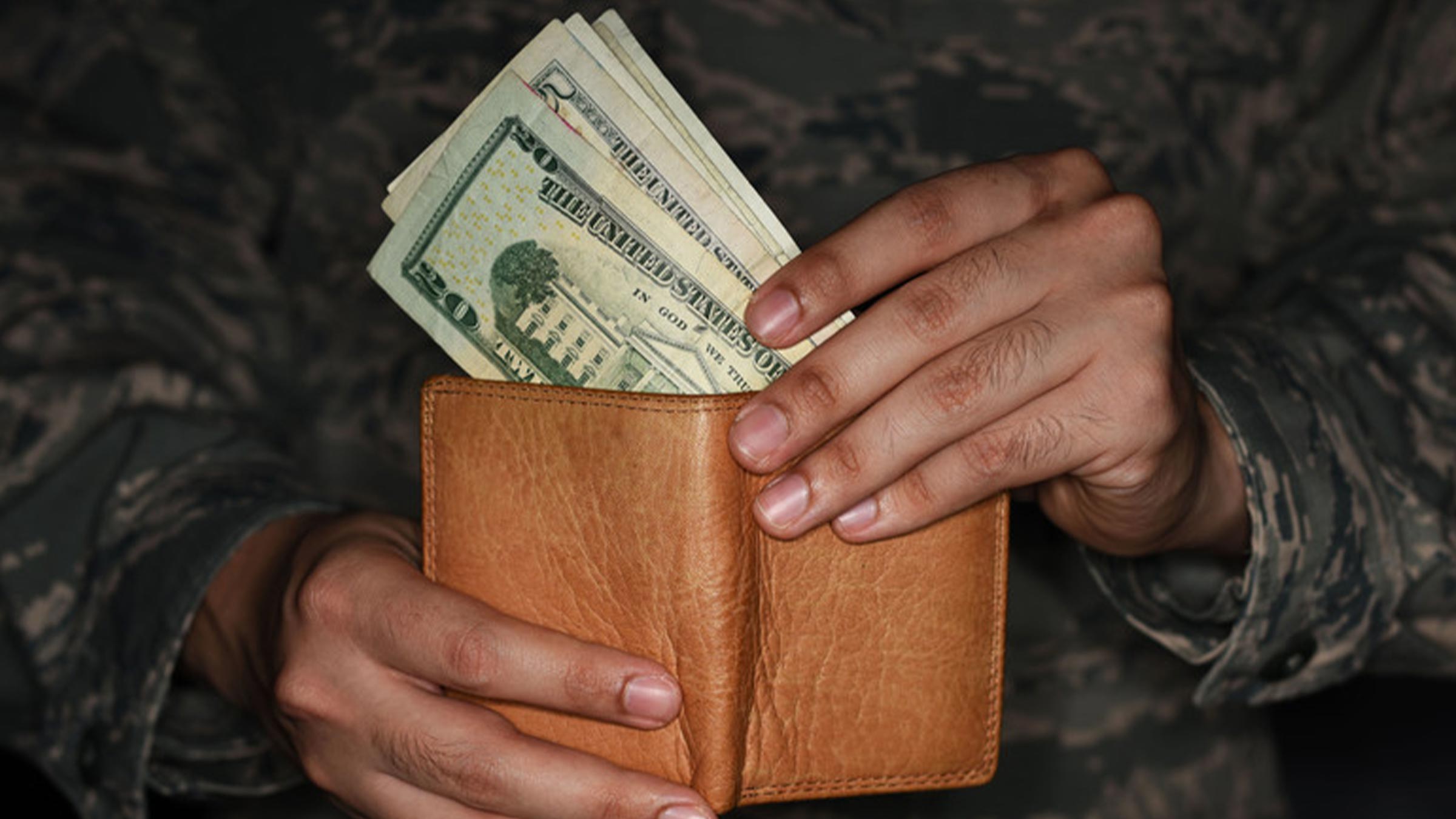 Airman pulls cash from wallet