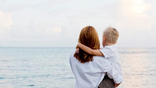 Mother and son looking at horizon