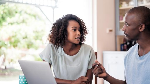 Couple talking at home