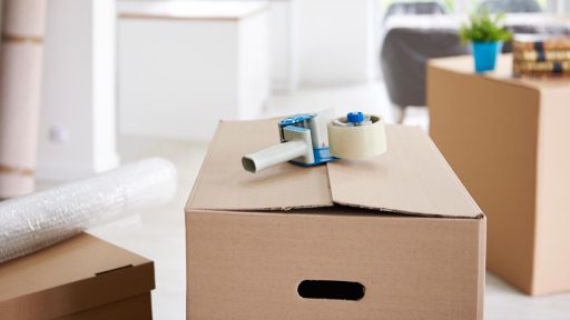 Packed moving box with tape and bubble wrap