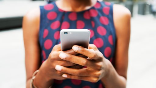 Woman uses cell phone