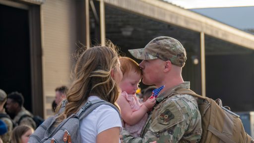 Air Force father with wife and child