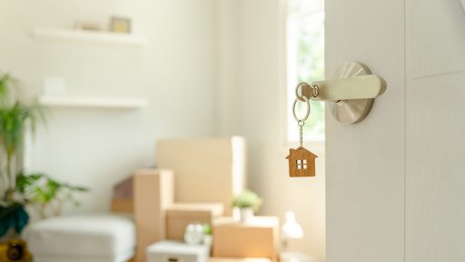 Key placed in the door to new apartment